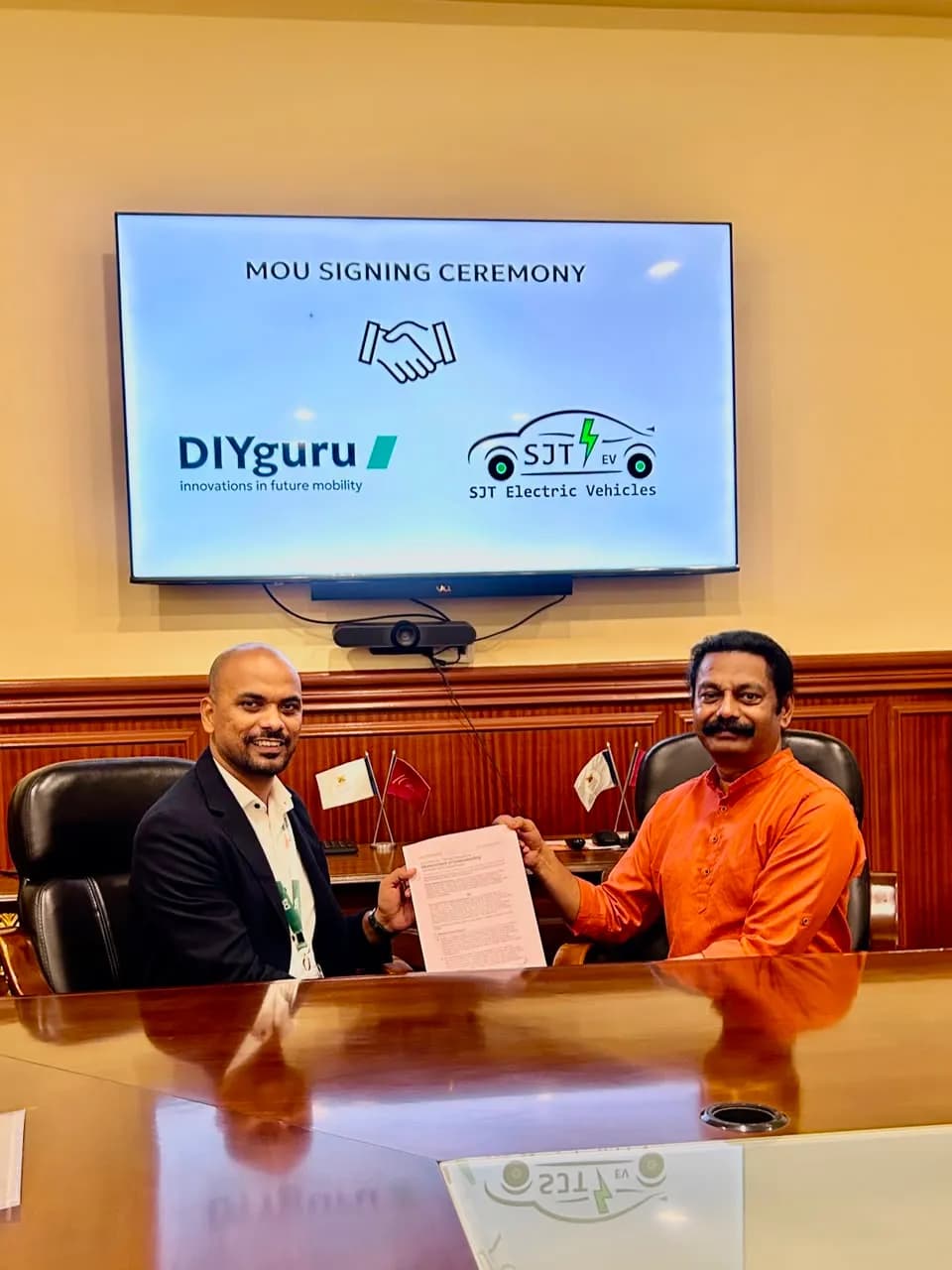 DIYguru and SJT Electric Vehicles signing a memorandum of understanding